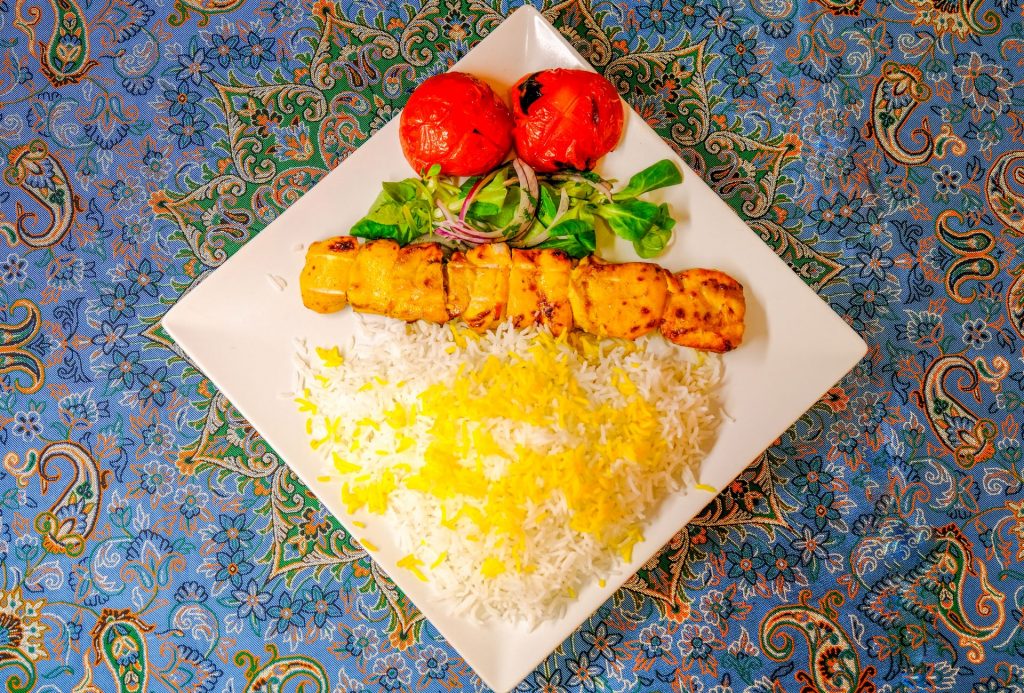 Persian chicken kebab with saffron basmati rice at PARSI Iranian & Halal restaurant in Madrid