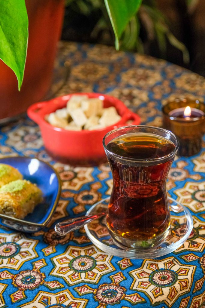 Traditional Persian tea served with Iranian desserts in a Persian restaurant in Madrid TITLE