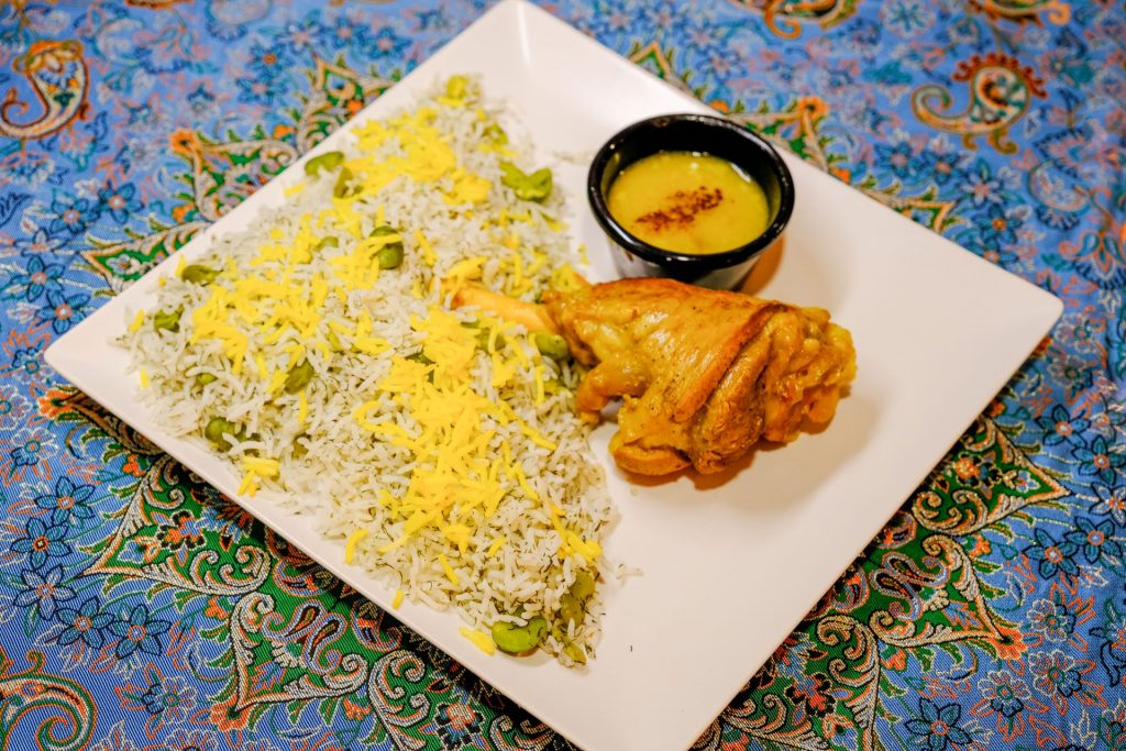 Baghali Polo ba Mahiche: Succulent lamb shank with fragrant dill and fava bean rice at PARSI Madrid.
