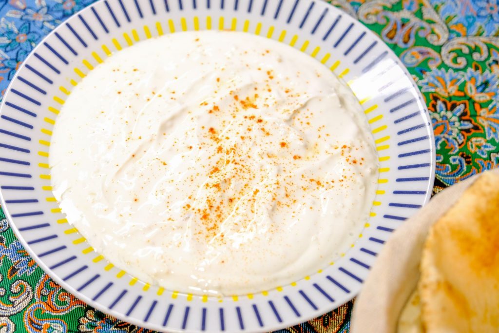 Authentic Mast-o Moosir: thick strained yogurt with wild Persian shallots at PARSI Madrid.